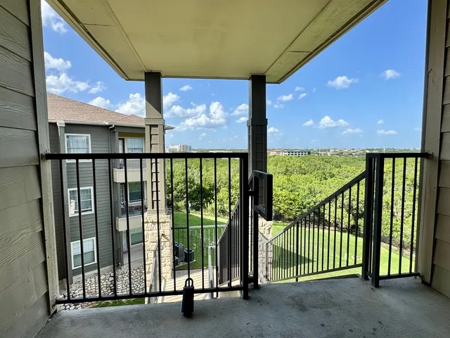 a view of a porch with a yard