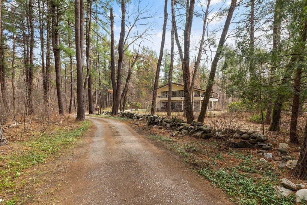 15 Spring Hill Road Acton, MA 01720 - Photo 1 of 22 a view of a pathway with a yard