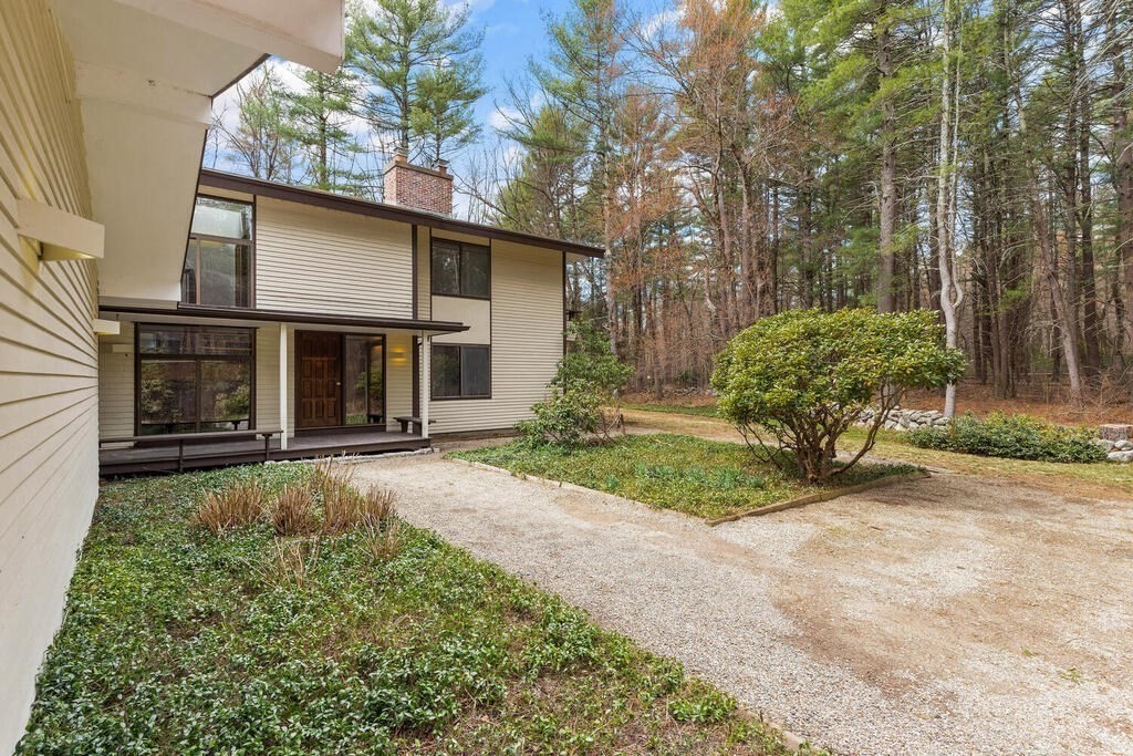 15 Spring Hill Road Acton, MA 01720 - Photo 10 of 22 front view of a house with a yard