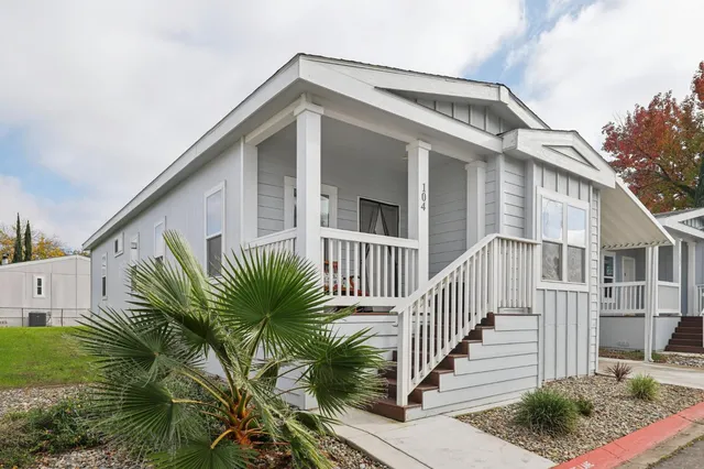 a front view of a house with balcony