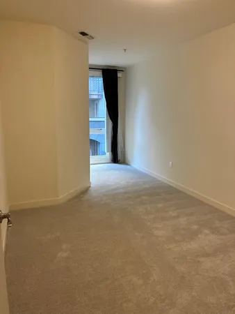 a view of a room with an empty space