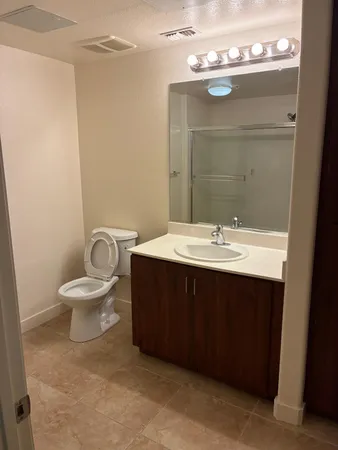 a bathroom with a sink and a toilet