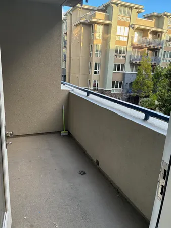 a view of a building from a balcony