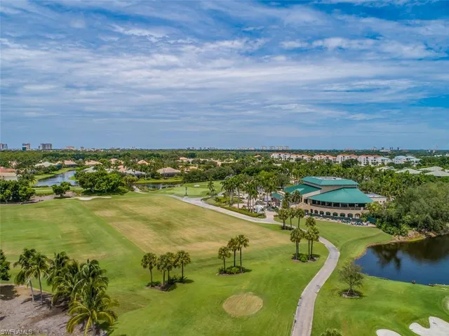 a view of a lake with a yard