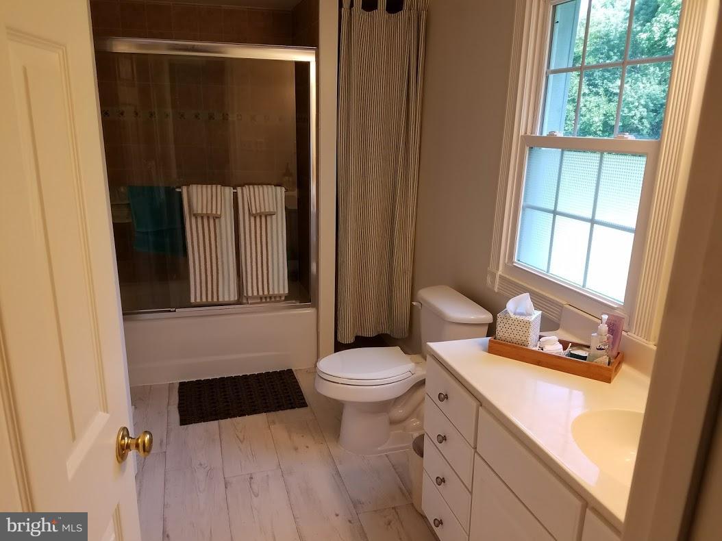 13612 Coppermine Road Union Bridge, MD 21791 - Photo 10 of 15 a bathroom with a sink a toilet and shower