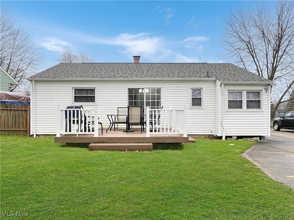 3968 Cannon Road Youngstown, OH 44515 - Photo 22 of 25 Rear view of property featuring a deck, a chimney, and roof with shingles