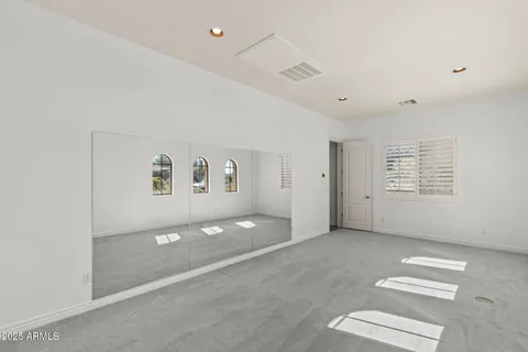 a view of a table and chairs in patio