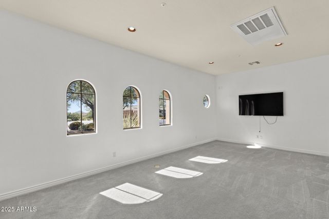 a view of a terrace with furniture