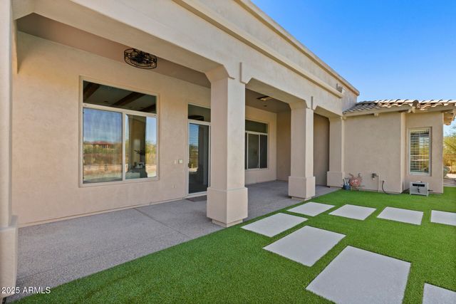 a view of a park with many windows