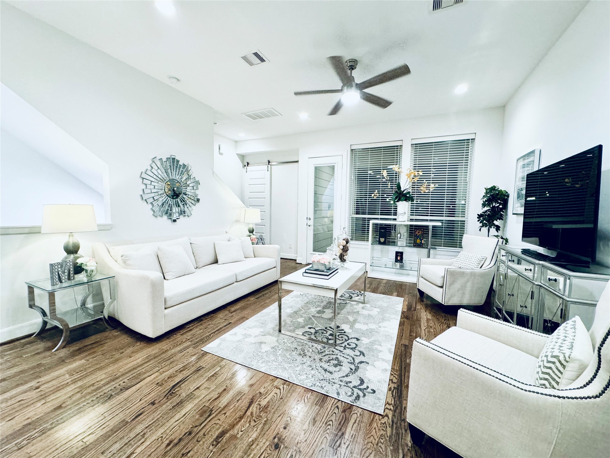 2717 Clinton Drive Houston, TX 77020 - Photo 3 of 22 a living room with furniture and a flat screen tv