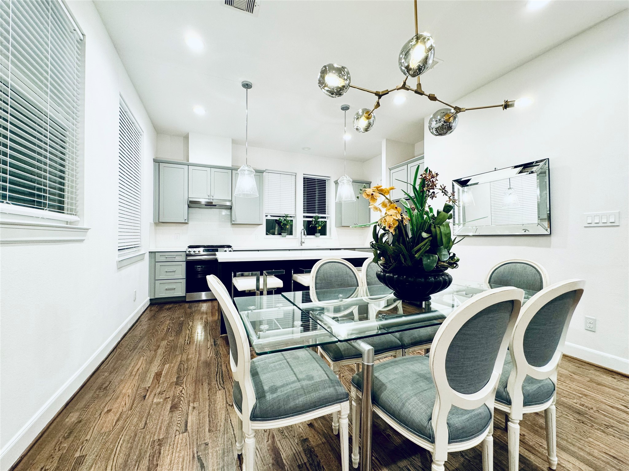 2717 Clinton Drive Houston, TX 77020 - Photo 4 of 22 a view of a dining room with furniture and wooden floor