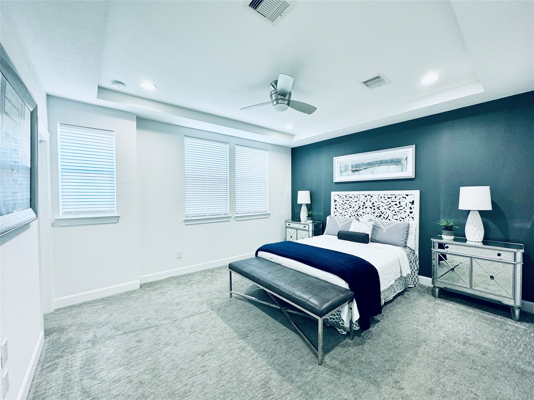 2717 Clinton Drive Houston, TX 77020 - Photo 10 of 22 a spacious bedroom with a bed and a window