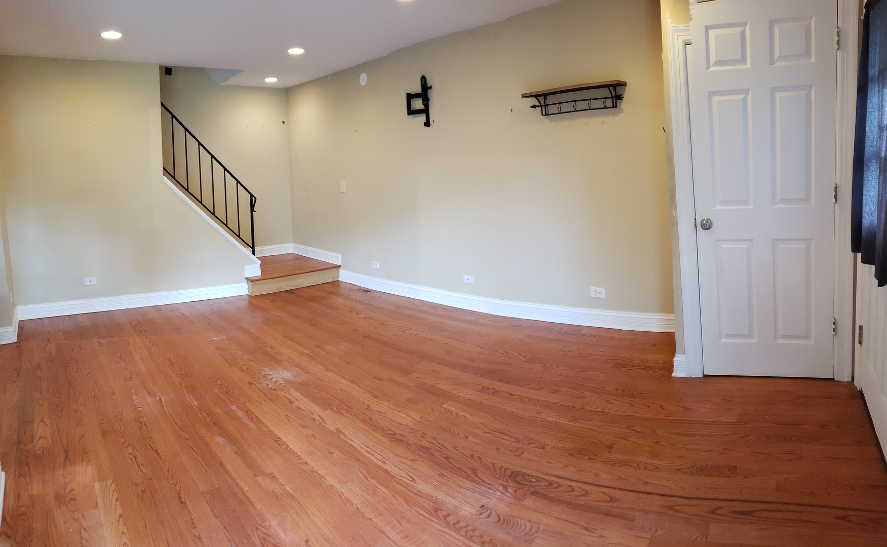 1150 Mt Vernon Court, Unit C Wheaton, IL 60189 - Photo 15 of 21 a view of an empty room with wooden floor
