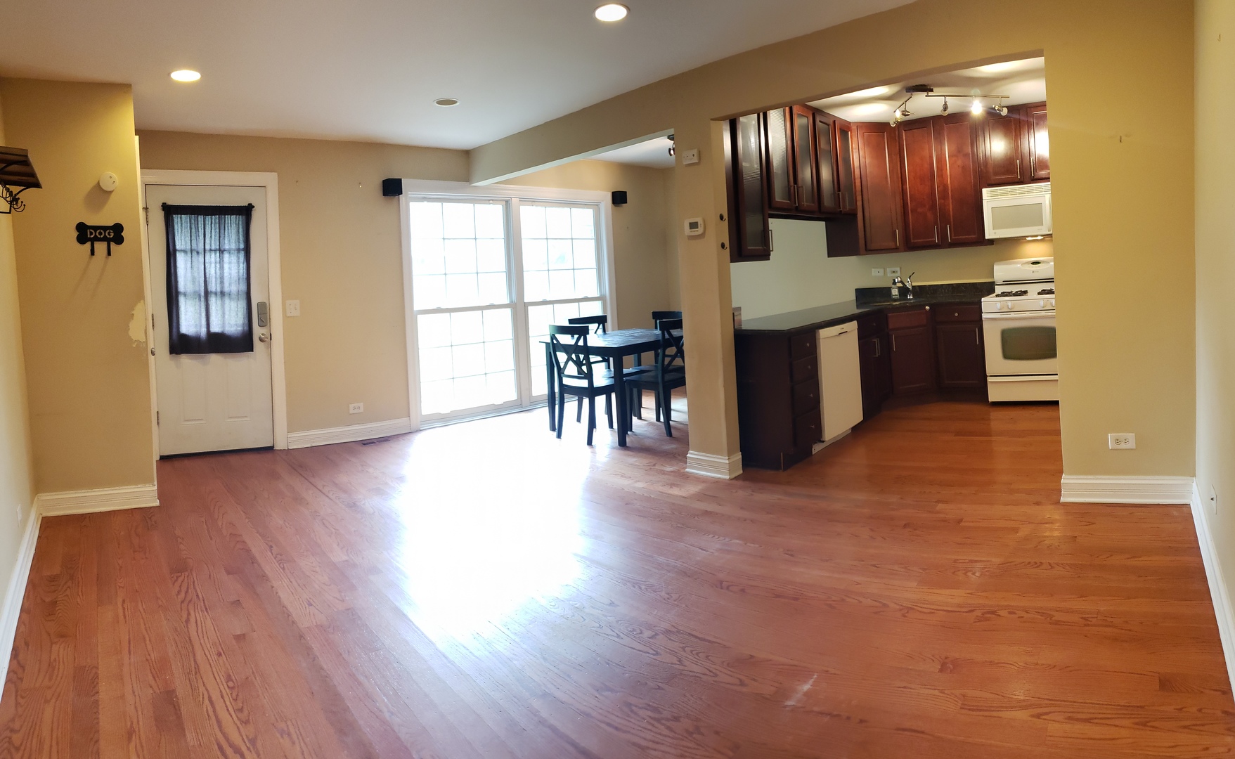 1150 Mt Vernon Court, Unit C Wheaton, IL 60189 - Photo 18 of 21 a view of kitchen with cabinets and wooden floor