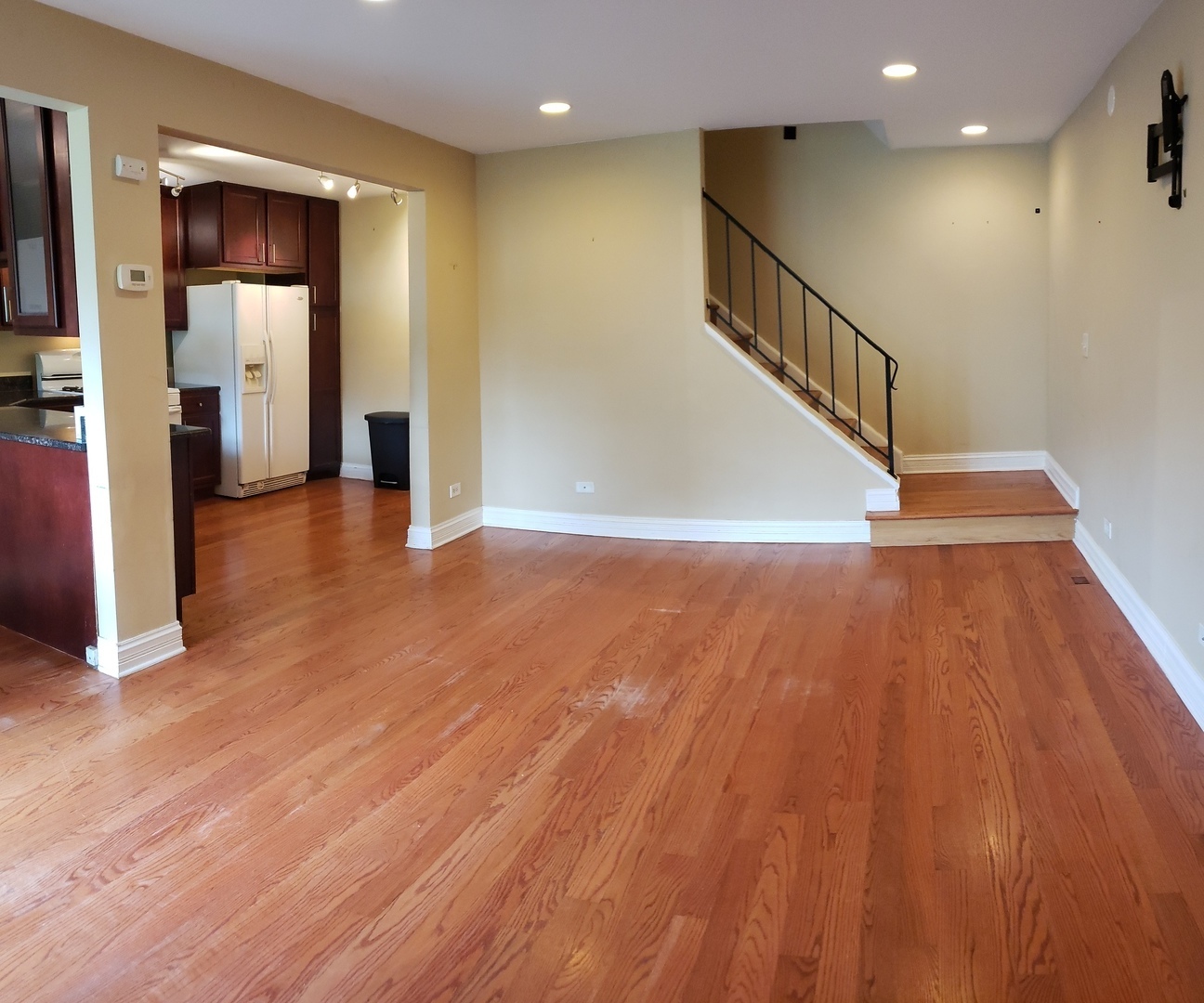 1150 Mt Vernon Court, Unit C Wheaton, IL 60189 - Photo 21 of 21 a view of a hallway with wooden floor
