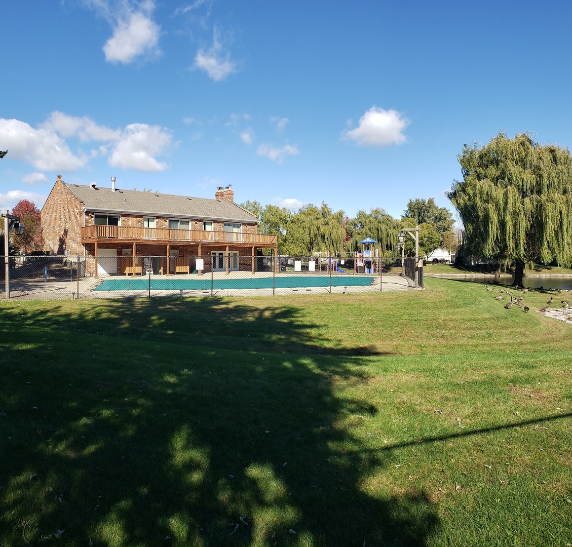 1150 Mt Vernon Court, Unit C Wheaton, IL 60189 - Photo 6 of 21 a view of building with outdoor space