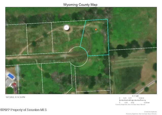 a bathroom with a shower and a sink