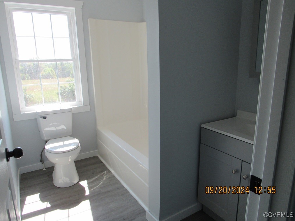 352 South Genito Road, Unit 352 Burkeville, VA 23922 - Photo 46 of 50 Bathroom with wood-type flooring, vanity, and toil