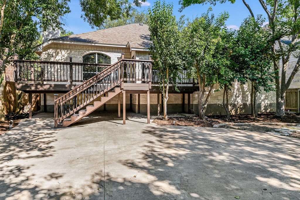 7909 Cobblestone Austin, TX 78735 - Photo 11 of 12 Back patio with view on to deck and house