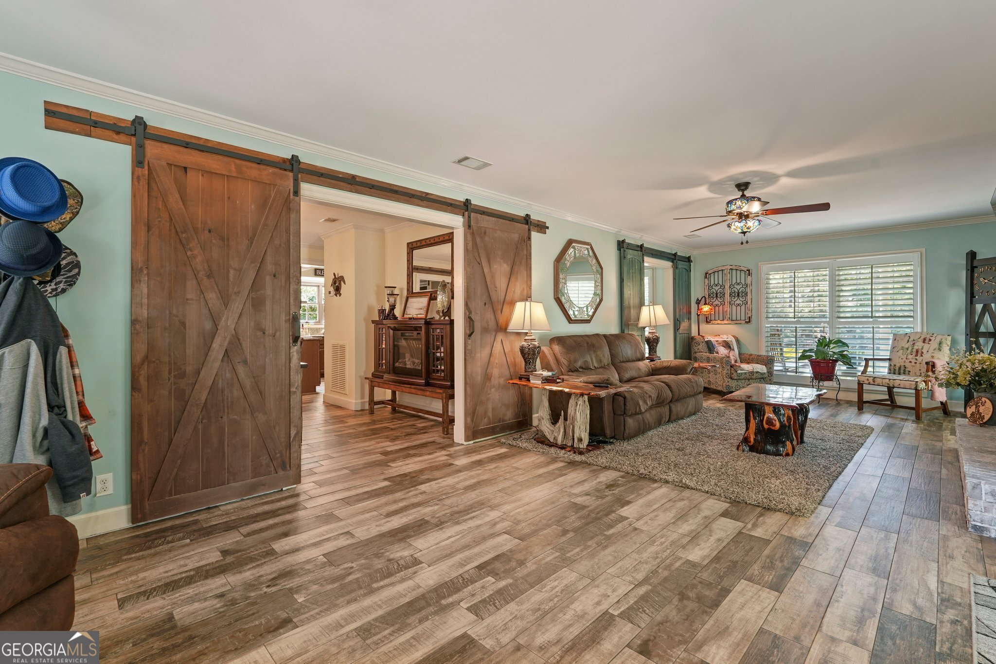 600 Shore Edge Trc St. Simons Island, GA 31522 - Photo 24 of 93 a living room with furniture and a wooden floor