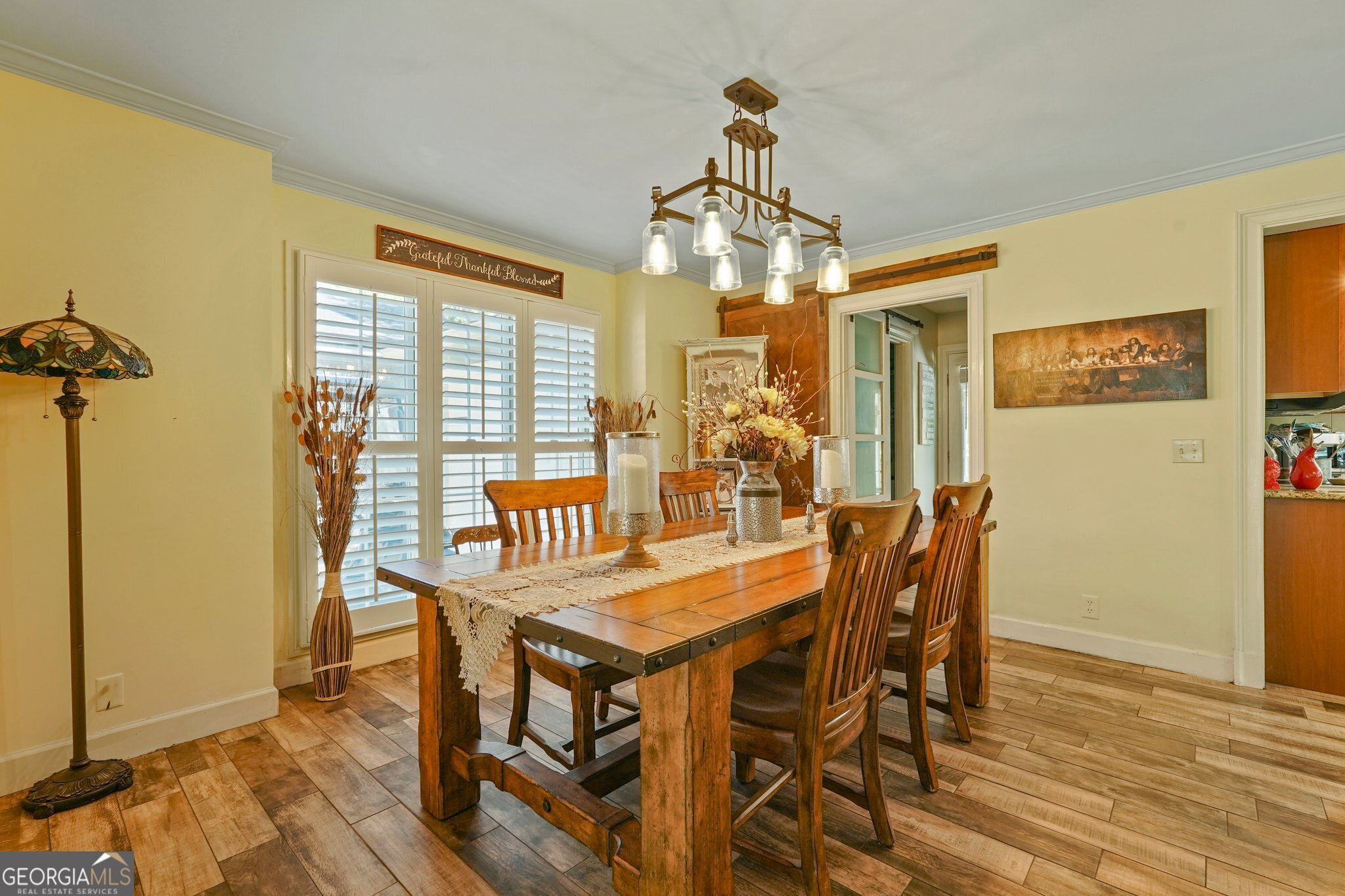 600 Shore Edge Trc St. Simons Island, GA 31522 - Photo 25 of 93 a view of a dining room with furniture window and wooden floor