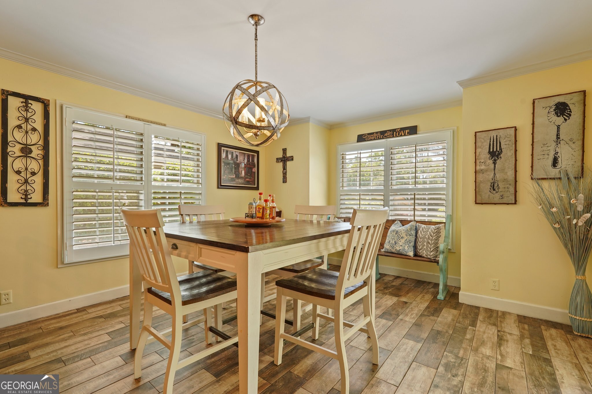 600 Shore Edge Trc St. Simons Island, GA 31522 - Photo 45 of 93 a view of a dining room with furniture and wooden floor