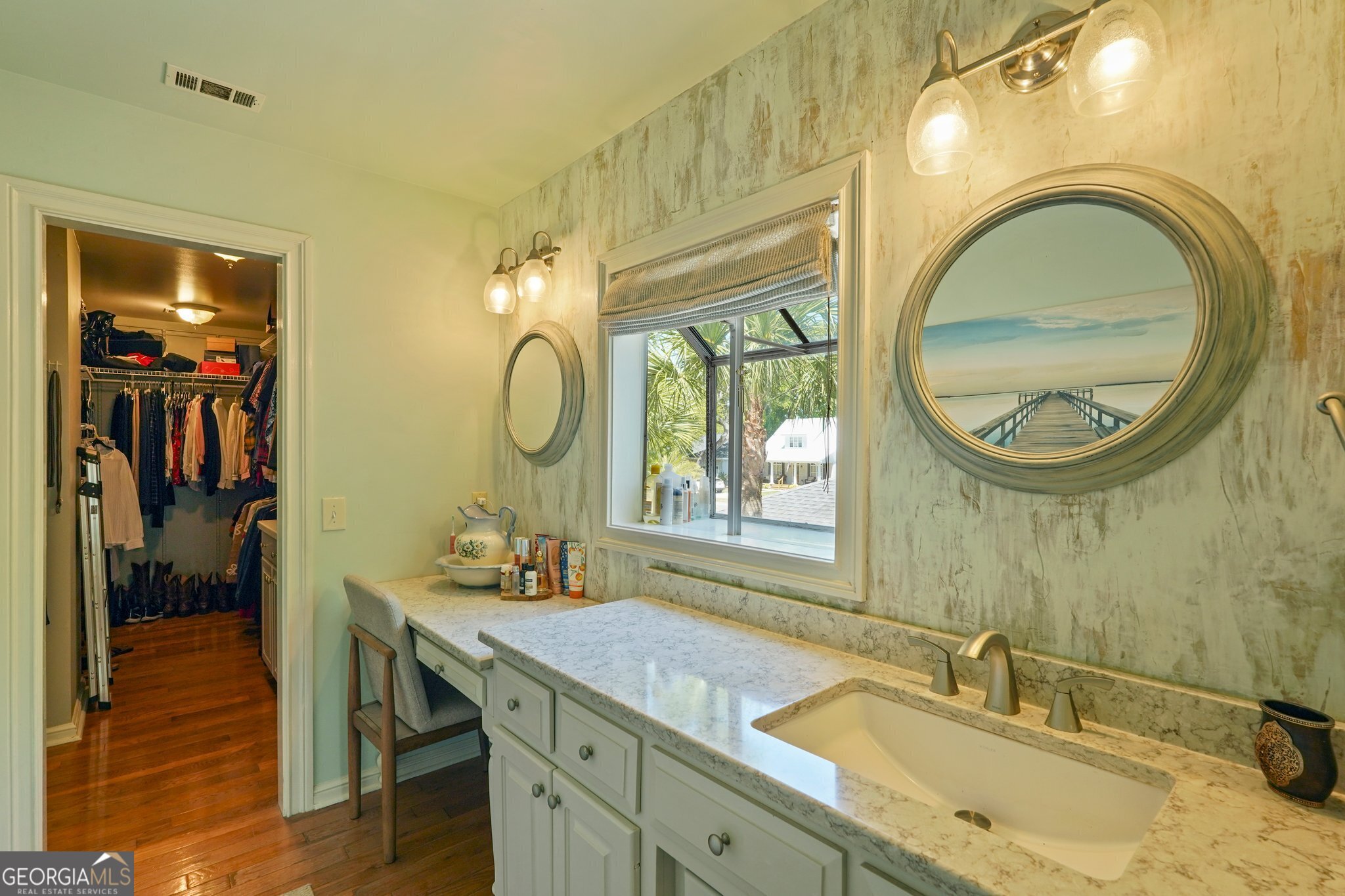 600 Shore Edge Trc St. Simons Island, GA 31522 - Photo 60 of 93 a bathroom with a granite countertop double vanity sink and a mirror