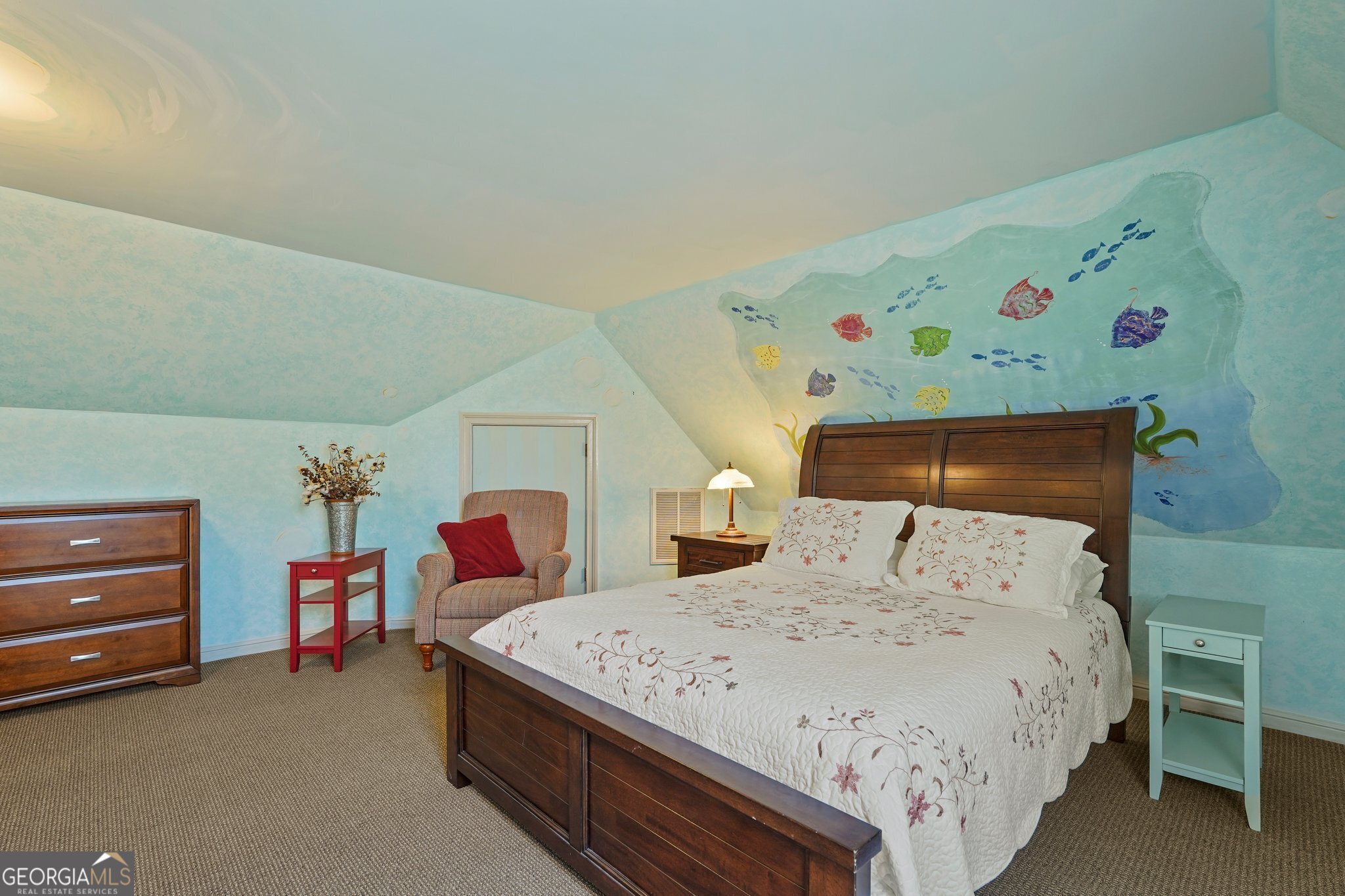 600 Shore Edge Trc St. Simons Island, GA 31522 - Photo 74 of 93 a bedroom with a bed and a dresser