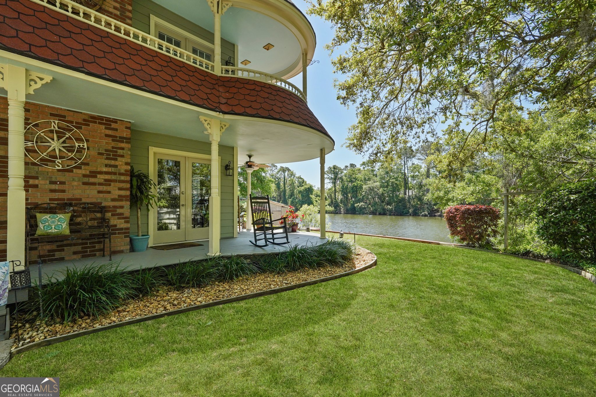 600 Shore Edge Trc St. Simons Island, GA 31522 - Photo 82 of 93 a view of a house with backyard and sitting area