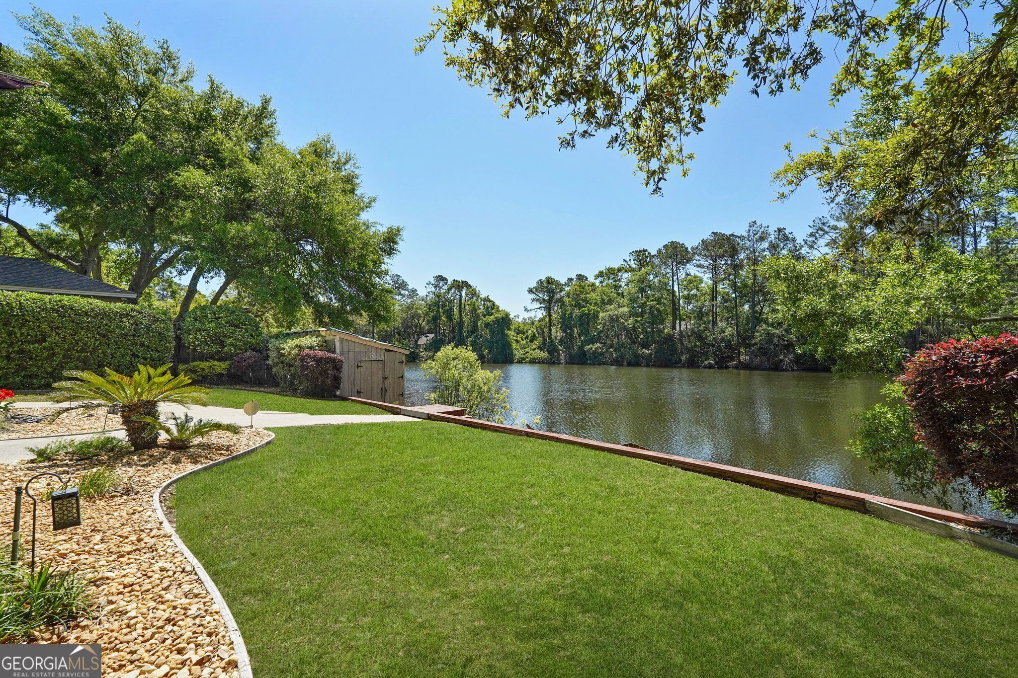 600 Shore Edge Trc St. Simons Island, GA 31522 - Photo 85 of 93 a view of a lake with houses