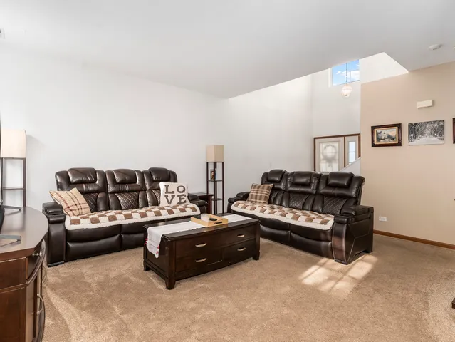 a living room with furniture and a couch