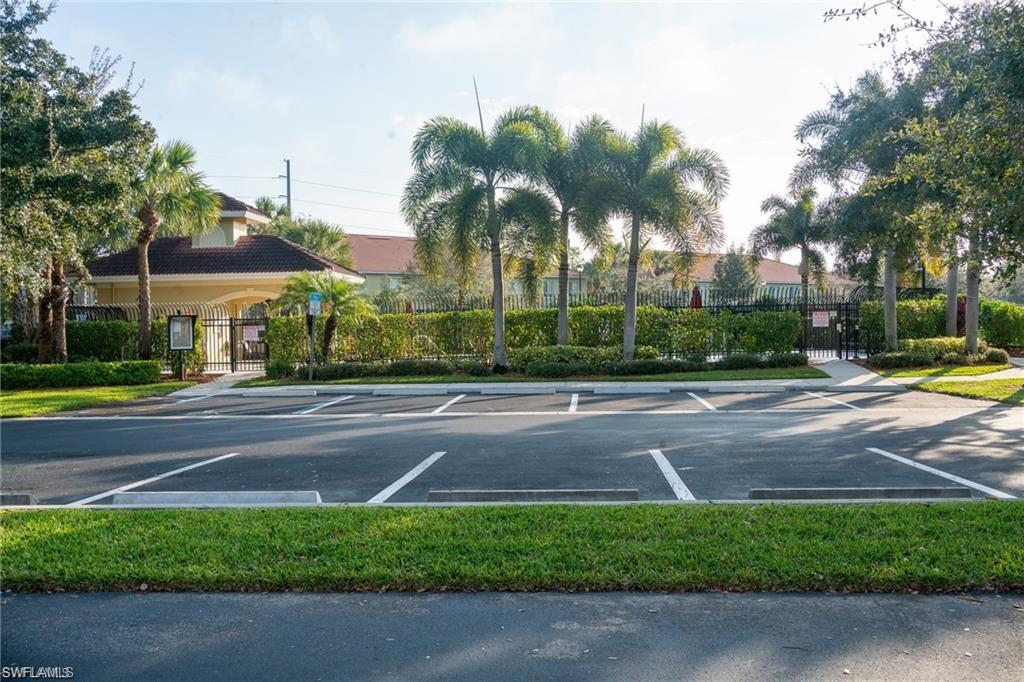 9430 Ivy Brook Run, Unit 403 Fort Myers, FL 33913 - Photo 2 of 25 a view of a yard in front of a house