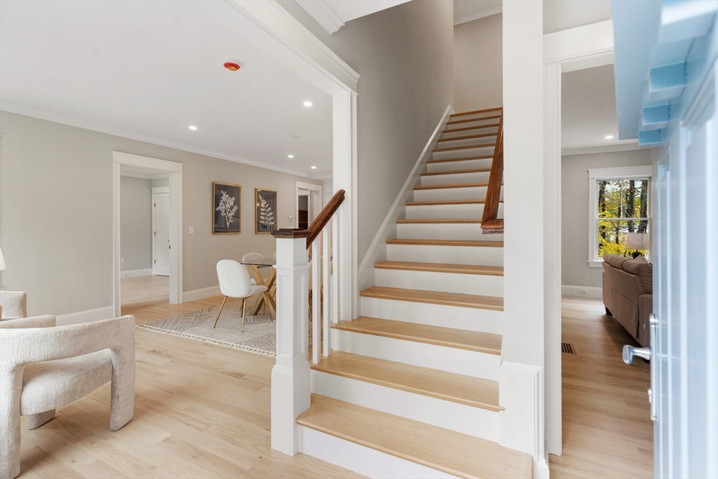 6 Revolutionary Road Lexington, MA 02421 - Photo 11 of 23 a view of entryway and hall with wooden floor