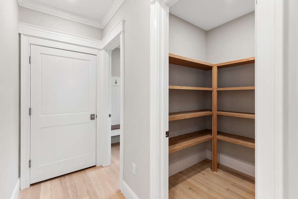 6 Revolutionary Road Lexington, MA 02421 - Photo 15 of 23 a view of walk in closet with empty racks