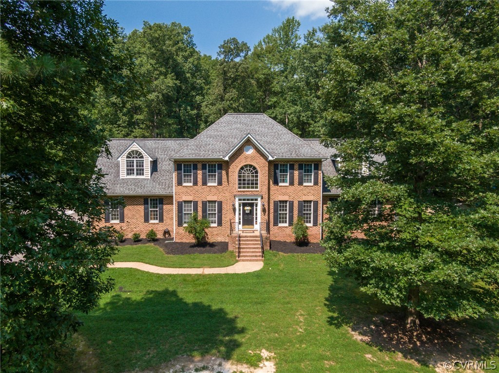 11518 Winterpock Road Chesterfield, VA 23838 - Photo 2 of 48 a front view of a house with yard and green space