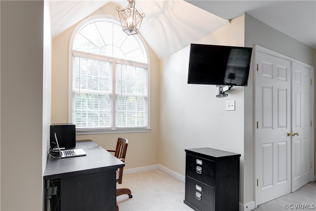11518 Winterpock Road Chesterfield, VA 23838 - Photo 27 of 48 a view of a workspace with furniture and a flat screen tv