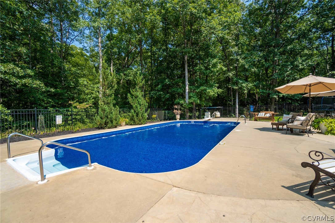 11518 Winterpock Road Chesterfield, VA 23838 - Photo 44 of 48 a view of outdoor space with swimming pool and sitting area