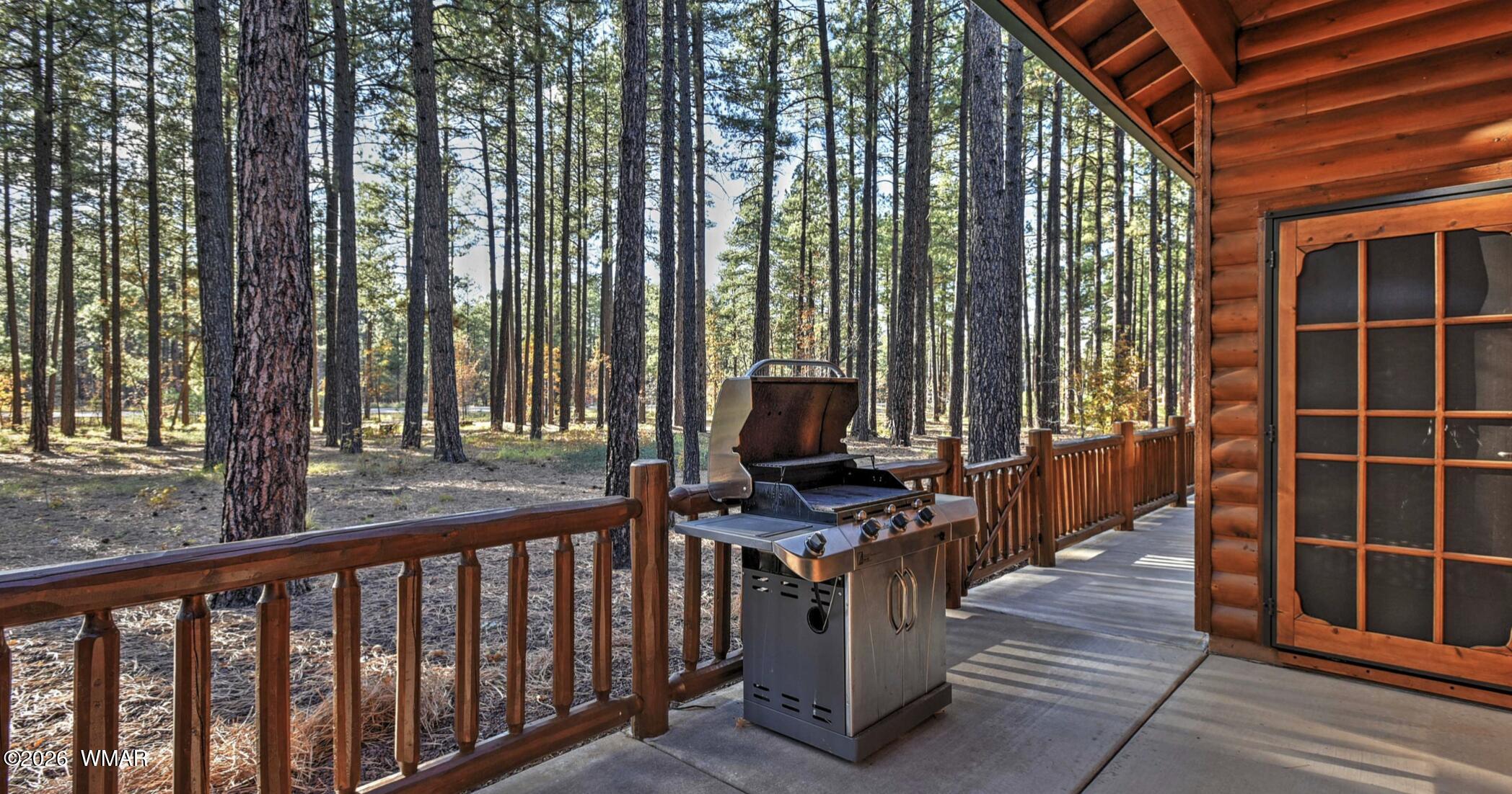 2942 Timber Line Road Pinetop, AZ 85935 - Photo 23 of 27 a view of entryway with wooden floor and fence