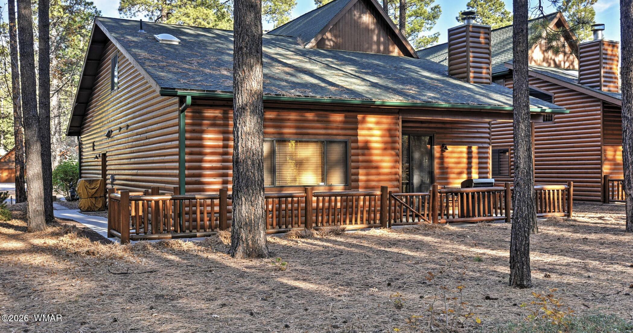 2942 Timber Line Road Pinetop, AZ 85935 - Photo 26 of 27 a view of a house with a porch