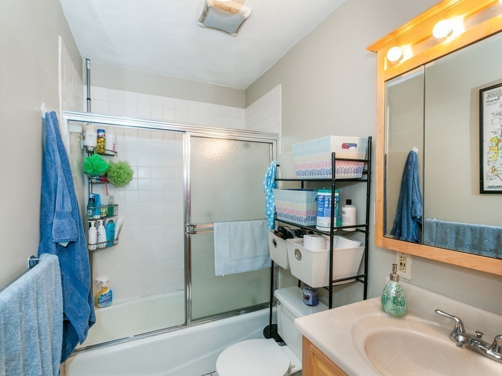 532 Tremont Street, Unit 4 Boston, MA 02118 - Photo 10 of 13 a bathroom with a sink toilet and shower