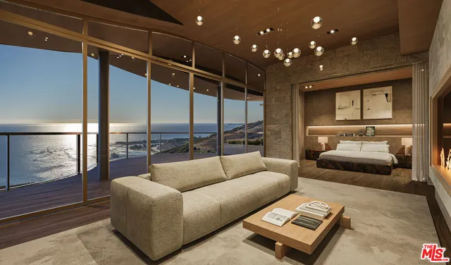 a living room with furniture and a ceiling fan