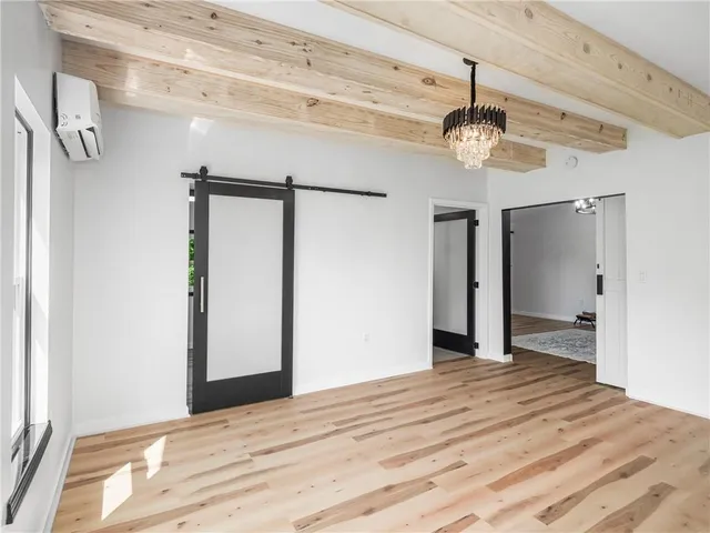 a bathroom with a shower and a toilet
