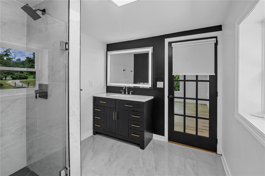 730 Fletcher Road Beaver, PA 15009 - Photo 25 of 39 a bathroom with a sink and a mirror