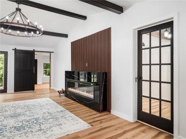 a workspace with furniture and wooden floor