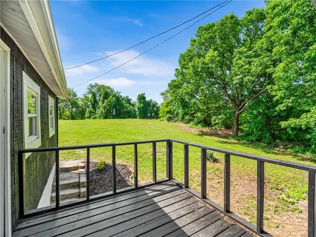 a house view with a garden space