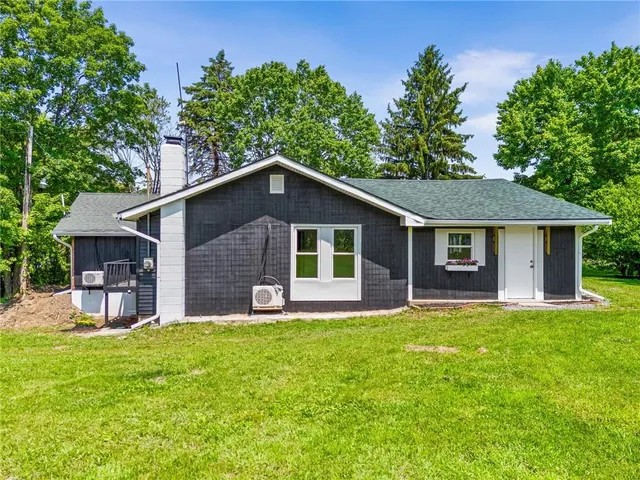 an aerial view of a residential houses
