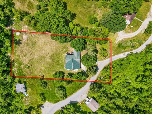 a view of a garden with a lake view