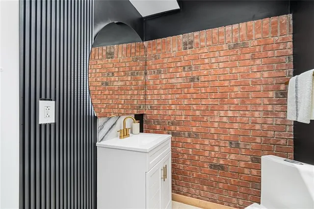 a bathroom with a sink and a shower