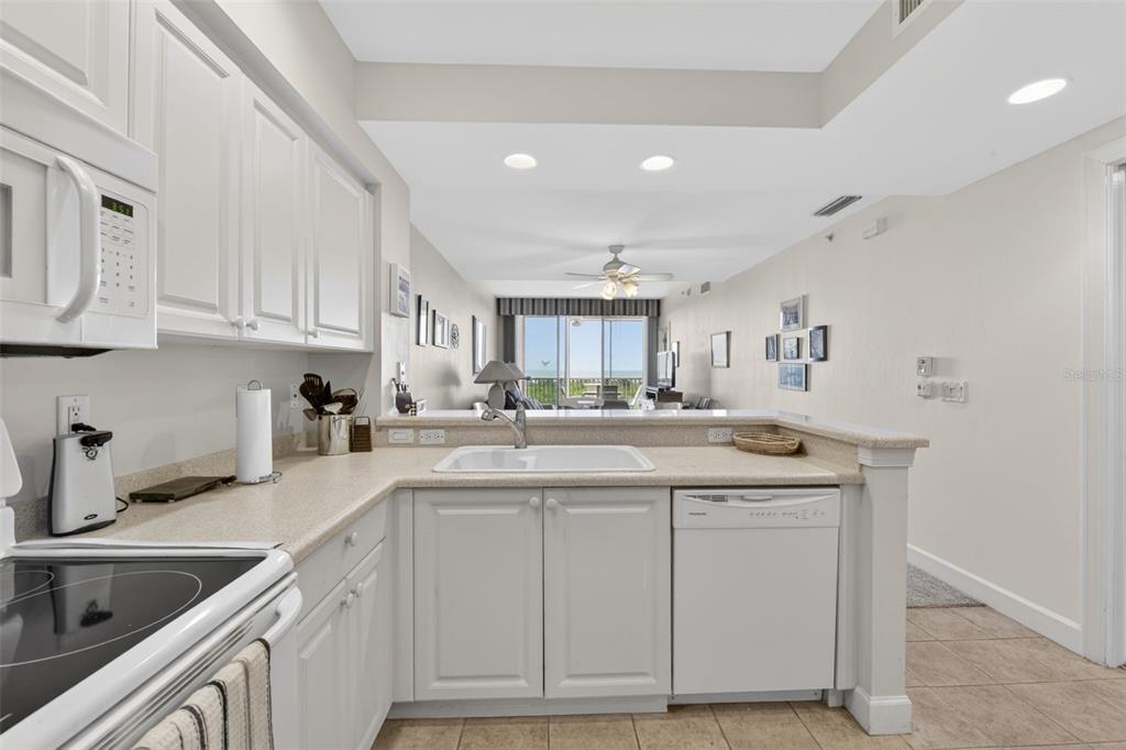 3191 Matecumbe Key Road, Unit 304 Punta Gorda, FL 33955 - Photo 16 of 31 a kitchen with cabinets and sink