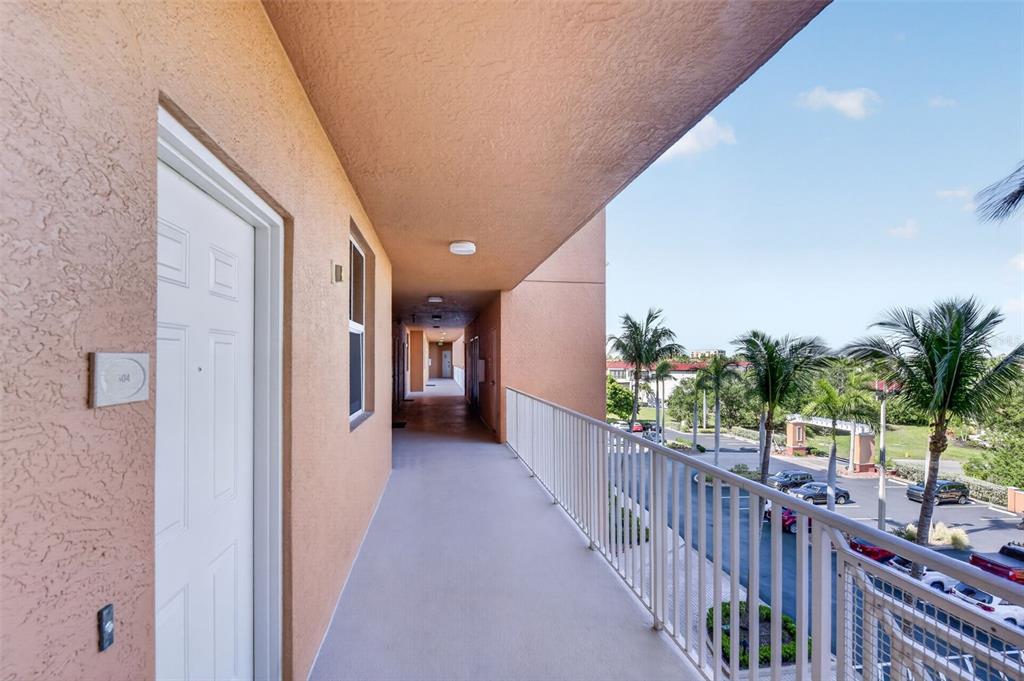 3191 Matecumbe Key Road, Unit 304 Punta Gorda, FL 33955 - Photo 26 of 31 a view of a house with balcony